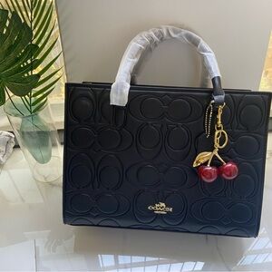Coach Black Embossed Logo Tote with Red Cherry Charm